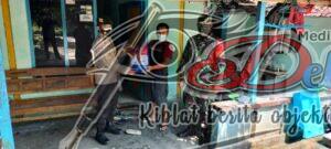 Polsek Ngawi, Bagikan Bansos Sembari Sosialisasikan Pentingnya PPKM Darurat