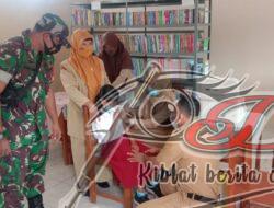 Ciptakan Herd Immunity Babinsa Bantu Siswa SD Dapatkan Vaksinasi Covid-19