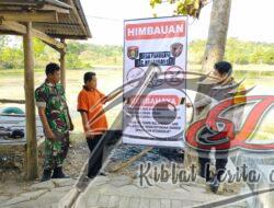 Polsek Karanganyar Pasang Banner Imbauan di Sungai
