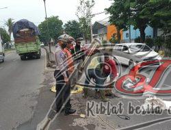 Jelang Nataru, Polres Pasuruan Mitigasi Jalur Surabaya-Malang, Tambal Jalan Berlubang
