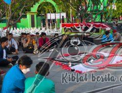 Polres Pasuruan Hadir Membersamai Aksi Damai Mahasiswa di TMP Bangil